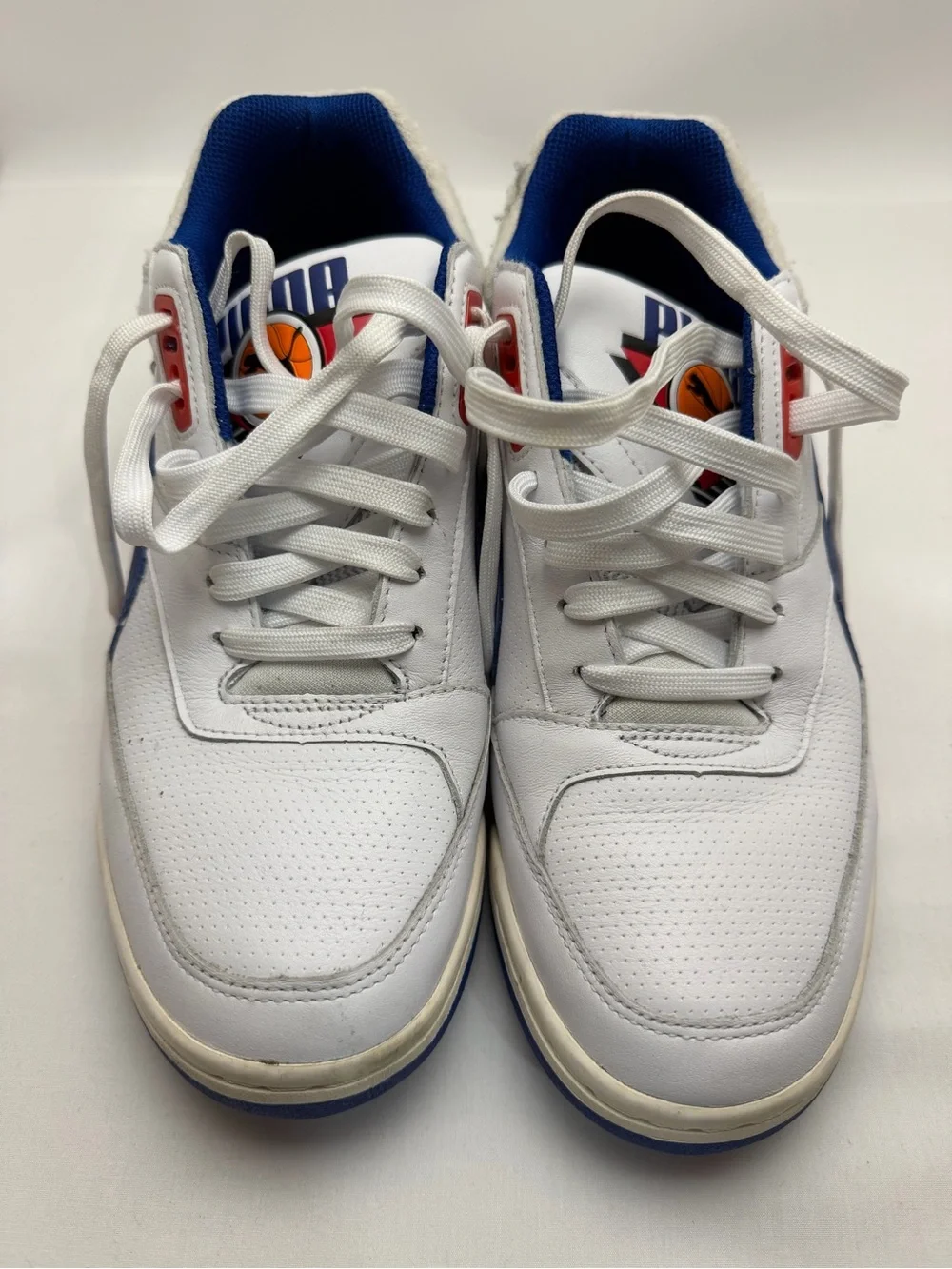 Puma White Athletic Sneakers with Blue and Red Accents